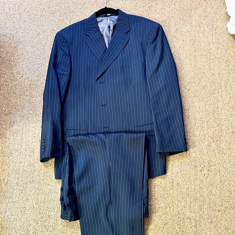 Gentlemens suit bundle. 4 gently used men’s suits.